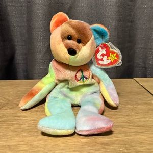 Extremely Rare with errors understuffed Beanie Baby Peace. Tag has style number.